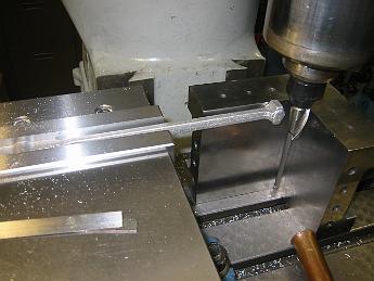  With two parallel machined surfaces clamped in the vice, we try to machine the other end.